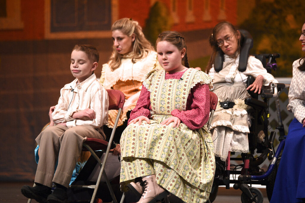 Actors from junior and senior programs performing