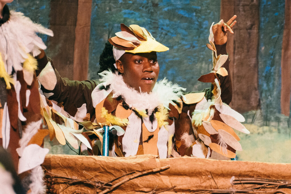 A female AWB actress on stage during a performance.
